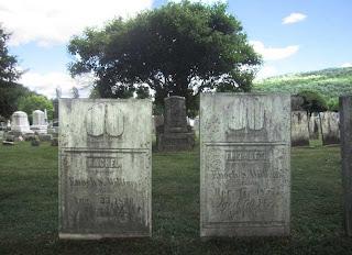 Two 19th century gravestones for two women, married to the same man