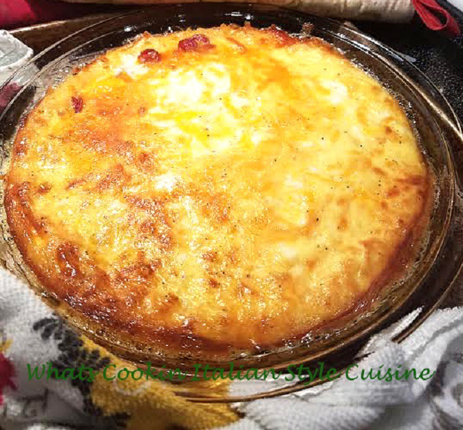 This is a baked frittata with melted cheeses on top. This frittata is mom's recipe and baked in the oven as an alternative to pan fried on the stove top. It has potatoes, pepperoni and eggs in it.