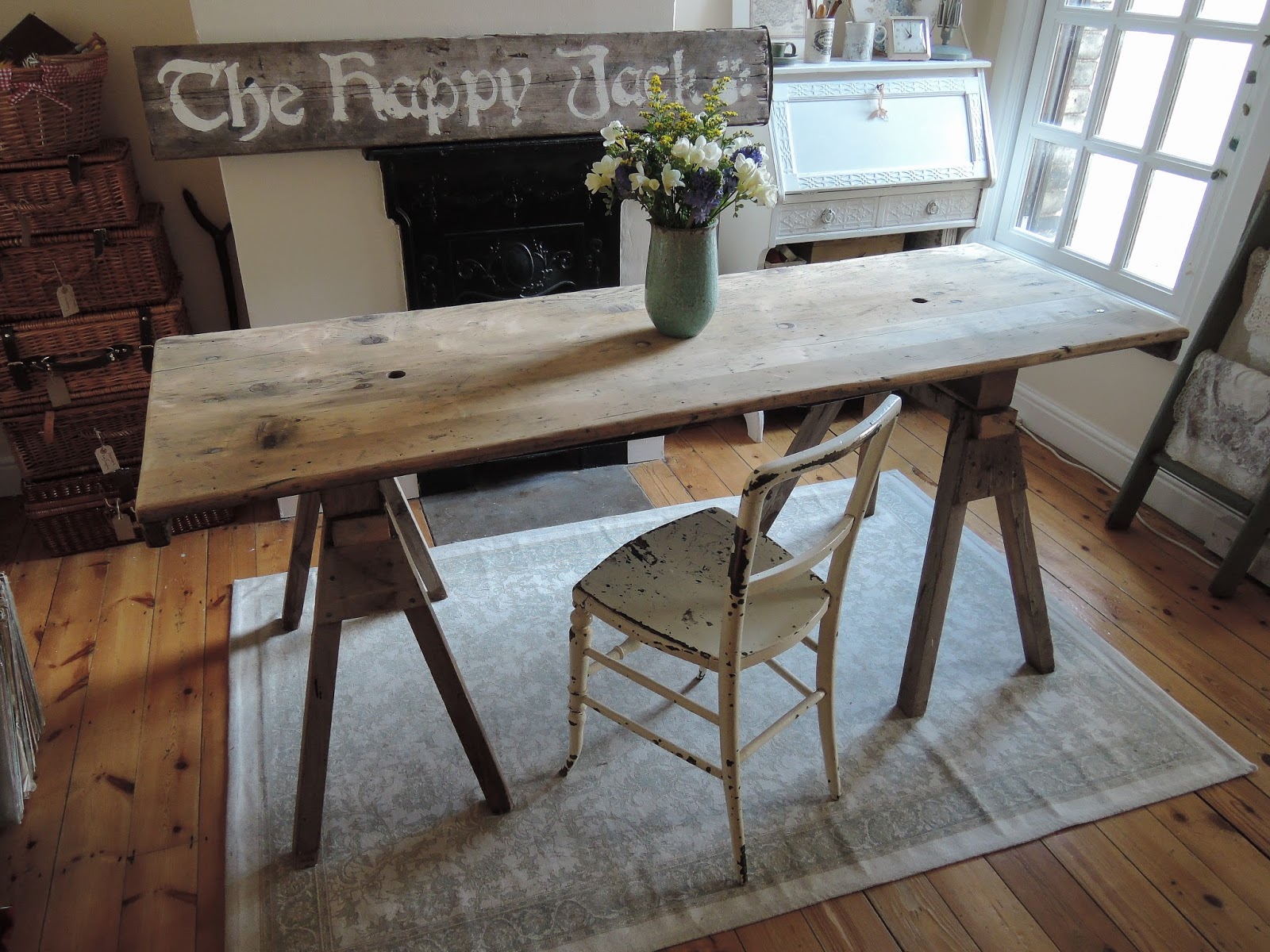 A handmade cottage DIY rustic 'scandi chic' farmhouse trestle table
