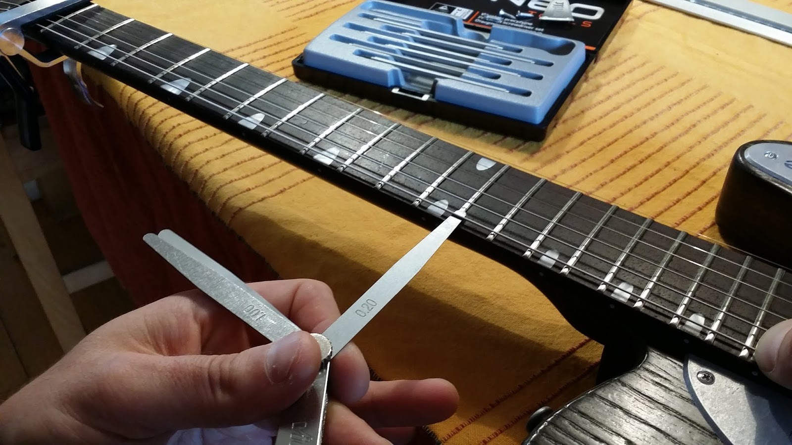 DIY Project Building a Partscaster Electric Guitar Setting the neck curve