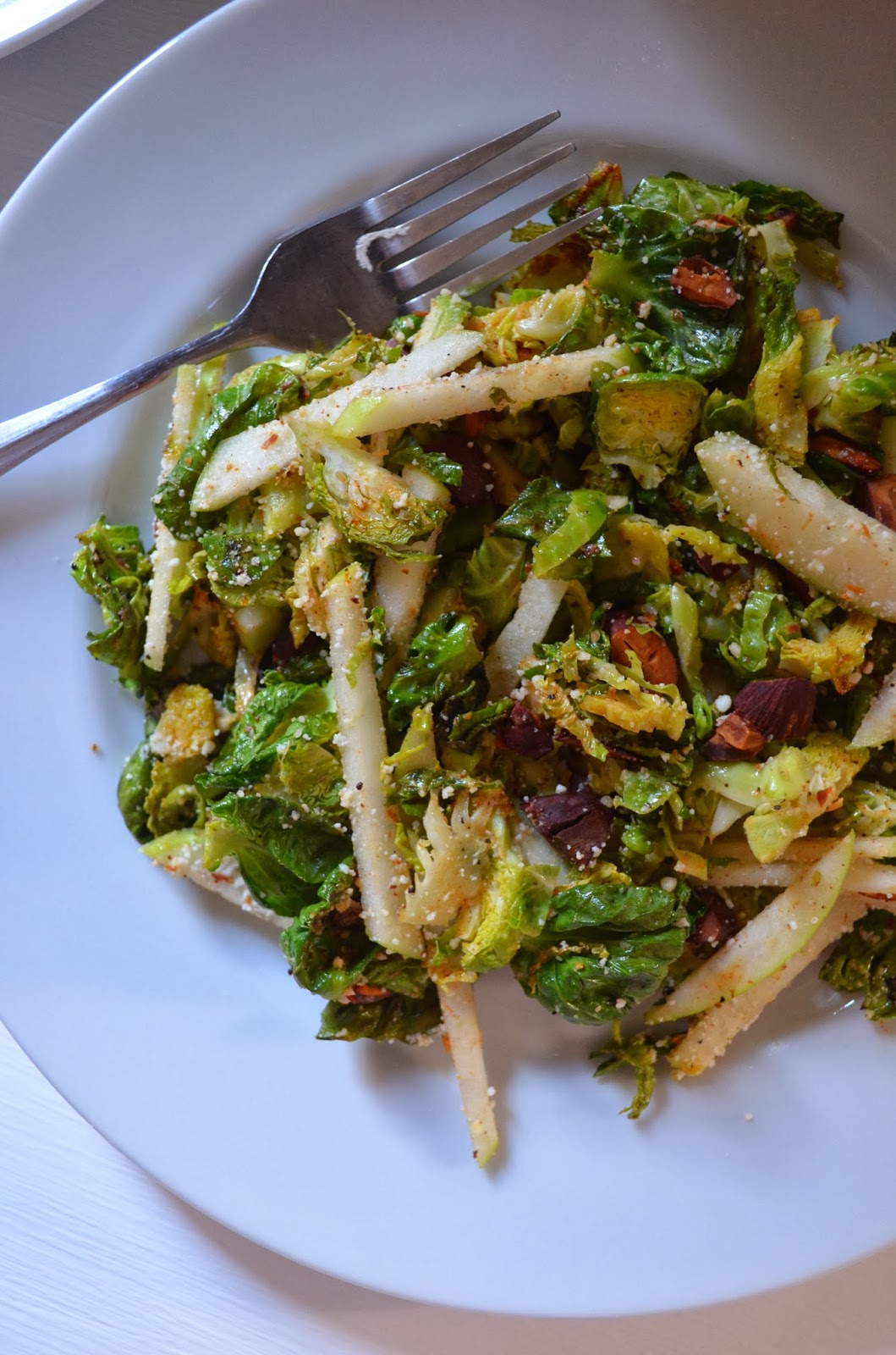 amour fou(d) brusselsprout salad with pecorino, toasted almonds, and