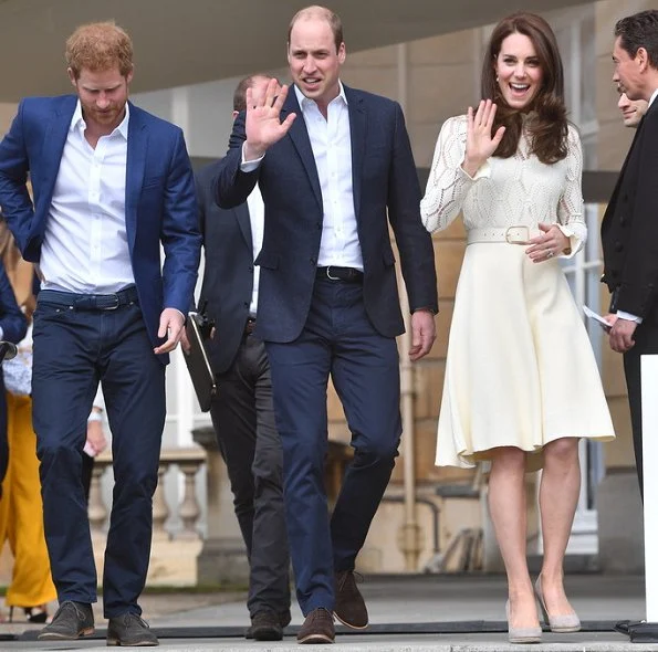 Prince William and Prince Harry . Kate Middleton wore See By Chloe cotton blend dress, Monsoon Fleur wedges and Acne Studios Leather waist belt