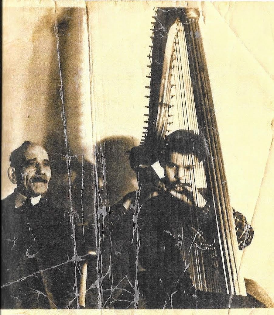 Great Grandfather giving my father harp lessons