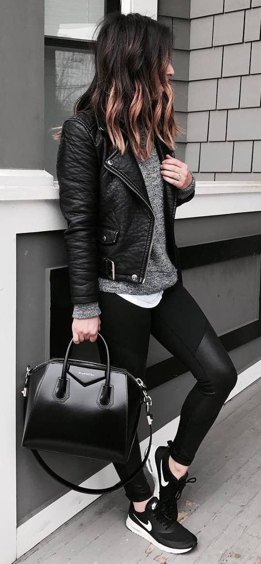 Edgy look Sporty pants, leather jacket, sneakers and sweater Just a