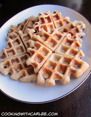 These delicious waffles are made with apple cider to bring the taste of fall to your table. Can be made sweet or savory! platter of golden belgian waffles