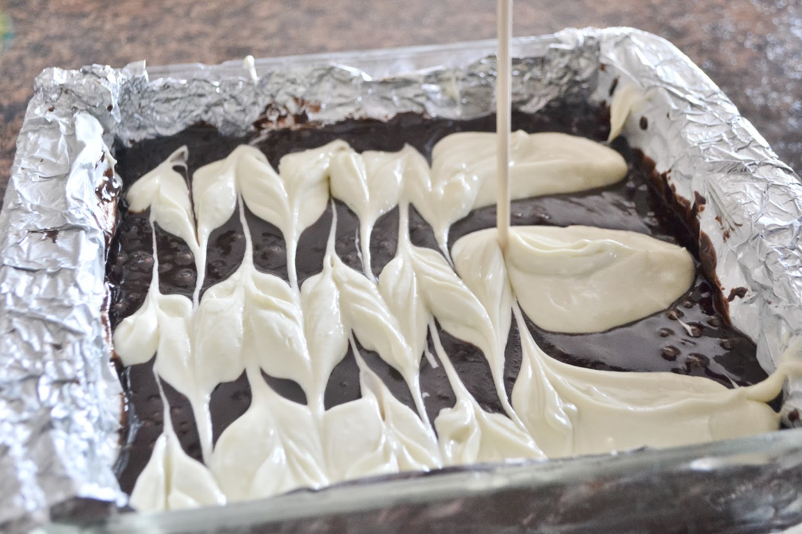 Cast Iron Stew Cheesecake Brownies