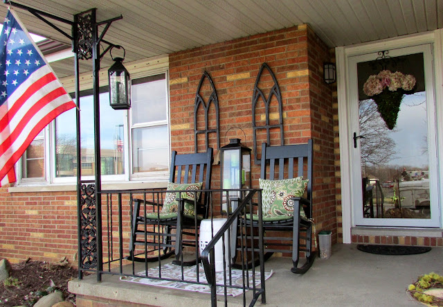 Decorating a small front porch for the spring season.