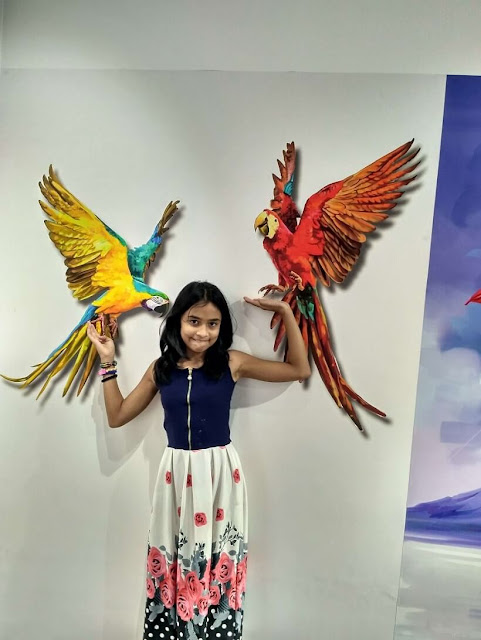 3 Dimensional painting on wall of birds