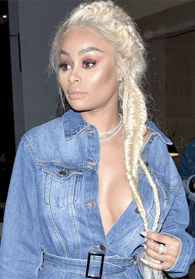 Deliberate? Blac Chyna's boobs pop out of her shirt just as paparazzi start snapping her (photos)