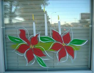 poinsettia window paintings with candles