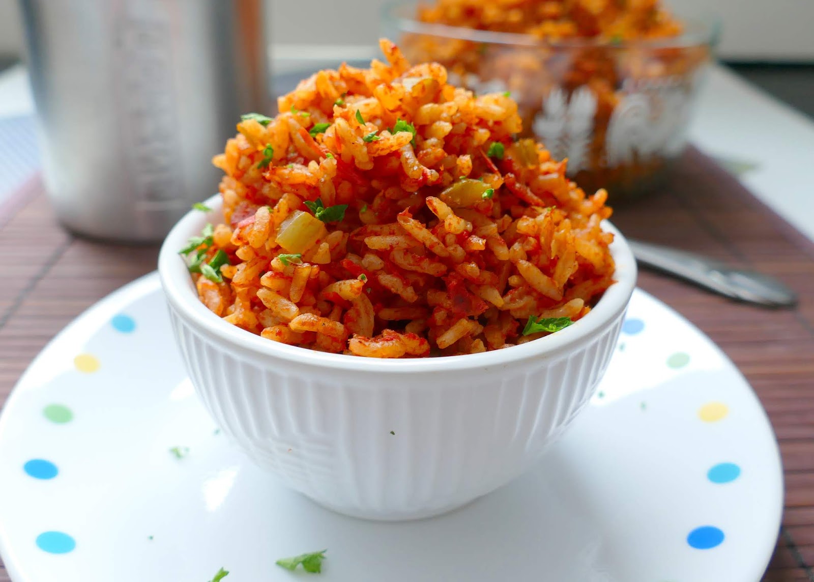 Southern Bacon Red Rice Recipe from Hot Eats and Cool Reads! Everything is better with bacon, especially this traditional southern side dish! Packed with flavor from tomatoes, onion, celery and garlic!