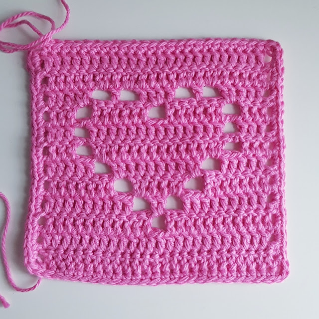 Pretty filet crochet heart baby blanket