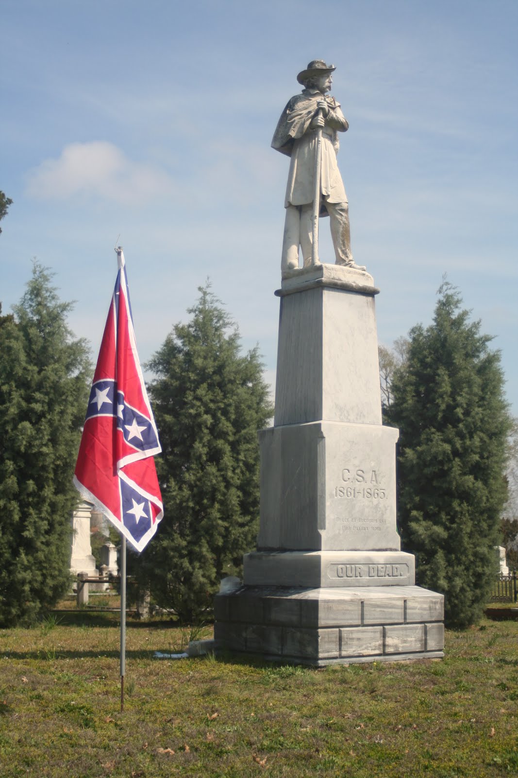 Free North Carolina Confederate monument over the mass grave of