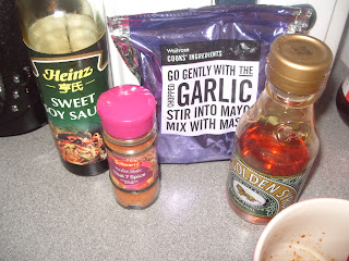 A selection of some of the ingredients used, including the spice mixes, garlic, soy sauce and maple syrup.