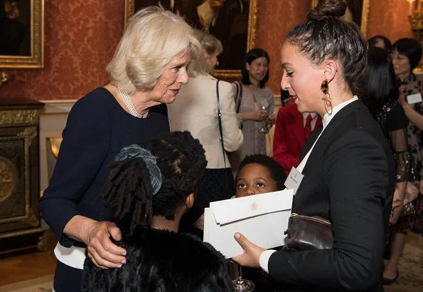 The Duchess congratulated the Commonwealth Essay Competition winners, Zahra Hussain, Ng Woon Neng, Janine Shum and Floria Gu