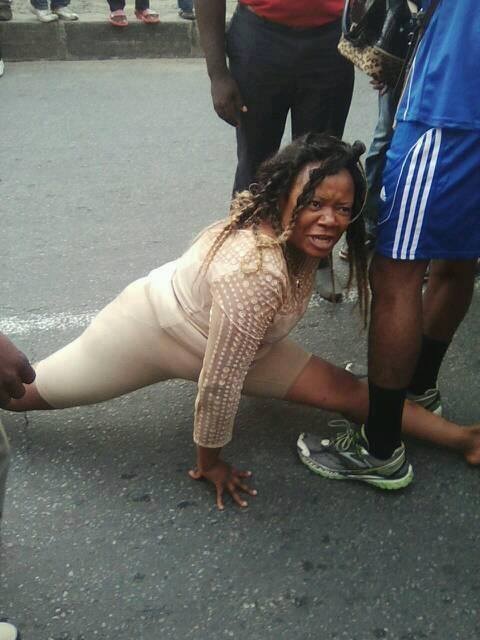 SHOCKING!! Woman Parks Posh Prado And Goes Insane On The Streets Of Douala