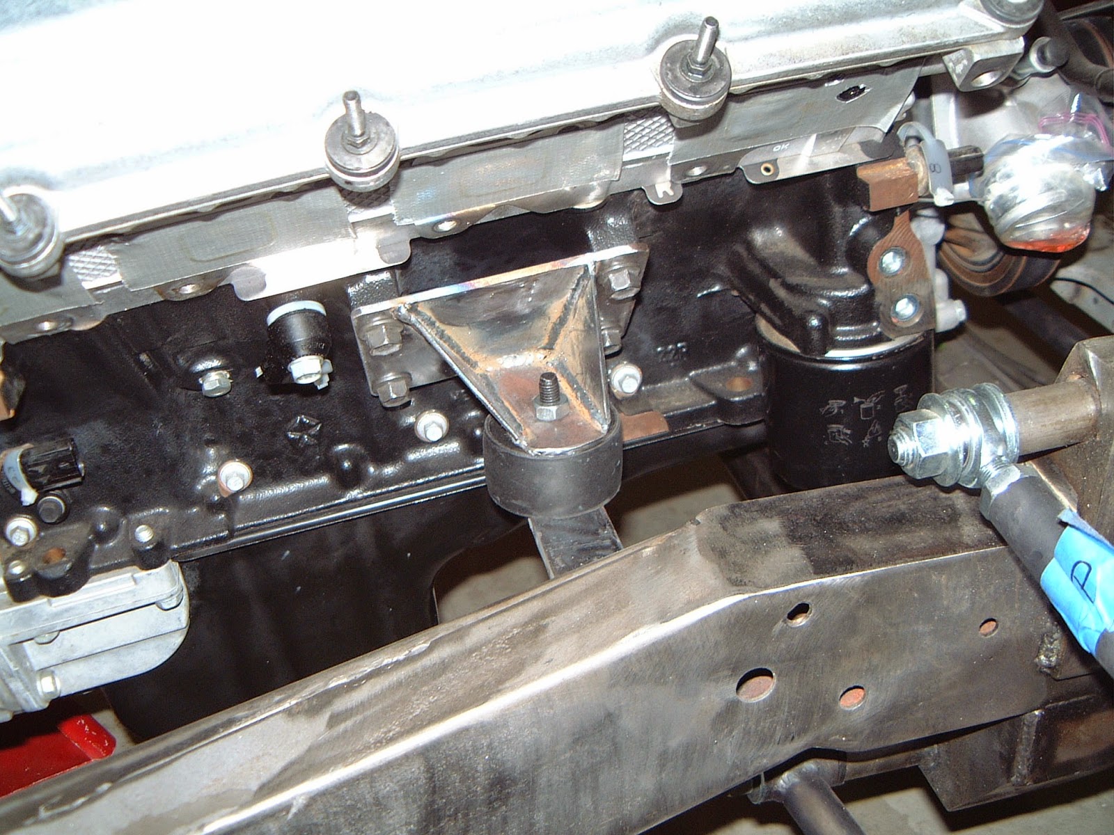 1937 Plymouth Motor mount fabrication. The mounts on the frame were