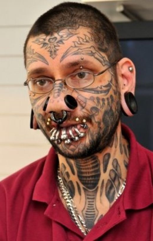 Facial tattoos and piercings