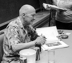 http://commons.wikimedia.org/wiki/File:RAHeinlein_autographing_Midamericon_ddb-371-14.jpg