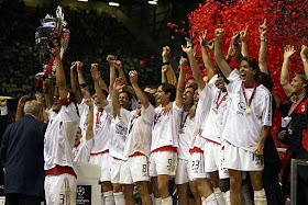 Inzaghi (centre, No 9) and the rest of the AC Milan team celebrate winning the Champions League in 2003