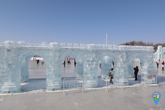 Castle wall in ice sculpture at Harbin Snow Sculpture Art Expo in Heilongjiang province, China Castle wall in ice sculpture at Harbin Snow Sculpture Art Expo in Heilongjiang province, China