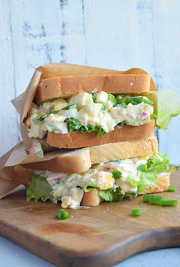 Best homemade Egg Salad Sandwich served wrapped in brown paper