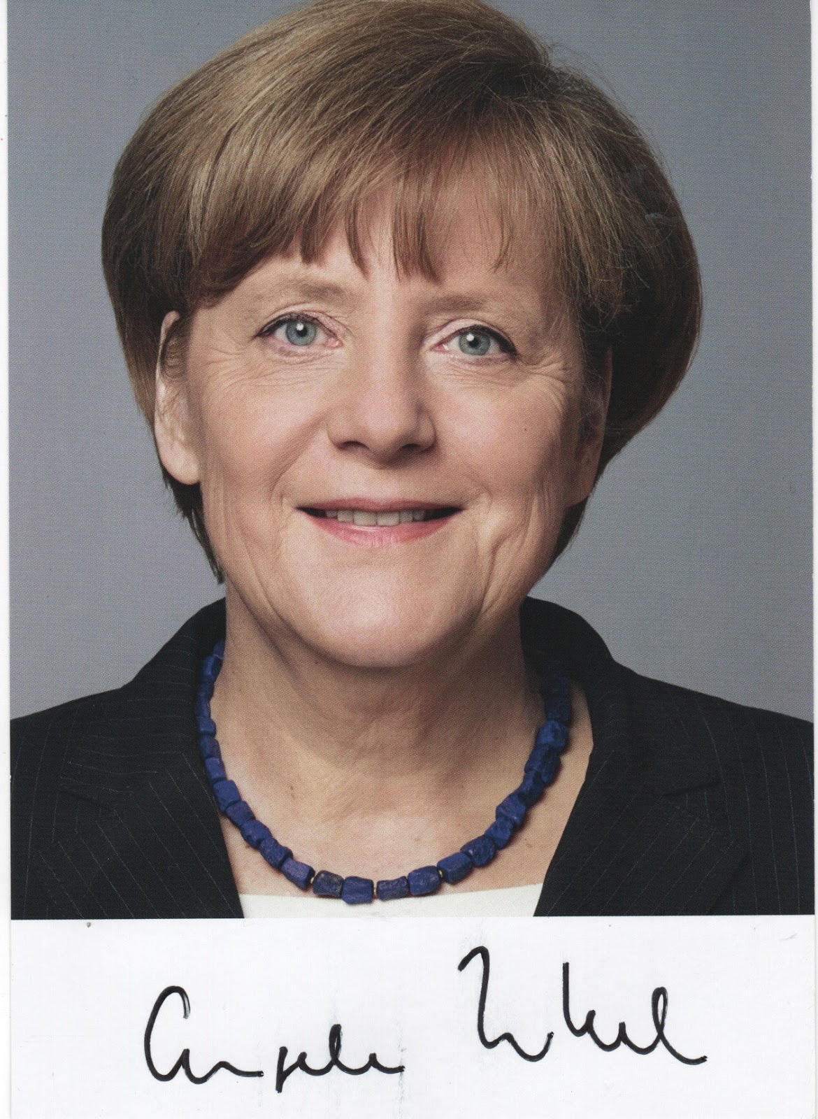 Kerry B. Collison Asia News German Chancellor Dr. Angela Merkel recognizes a Sid Harta
