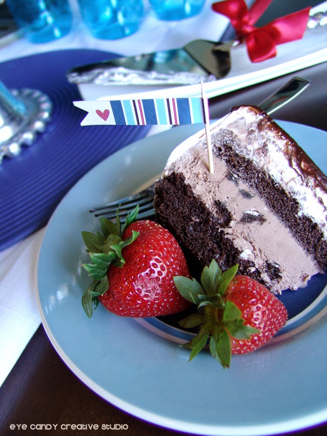 slice of ice cream cake on plate, free flag in cake, strawberries