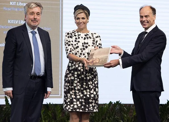 Queen Maxima wore Carolina Herrera Leaf Print Tweed Half Sleeve Dress and Natan pumps, she carried Chanel bag