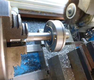 turning ends of rotor axle to fit into bearings