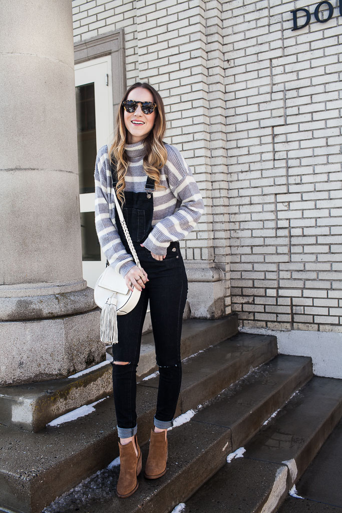 Pair a turtleneck with overalls for a cozy winter look.