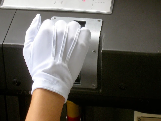 Japan Stereotypes: white gloves for cleanliness