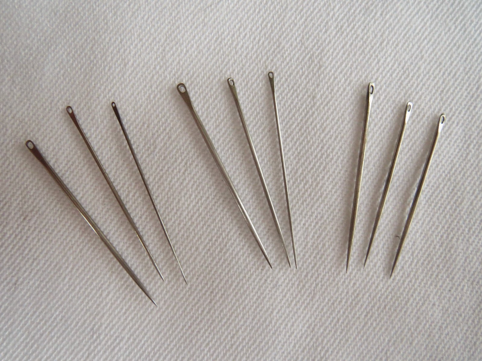 Threads Across the  Needles and Pins