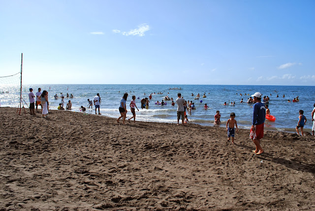 black sand beach at Villa del Prado beach resort