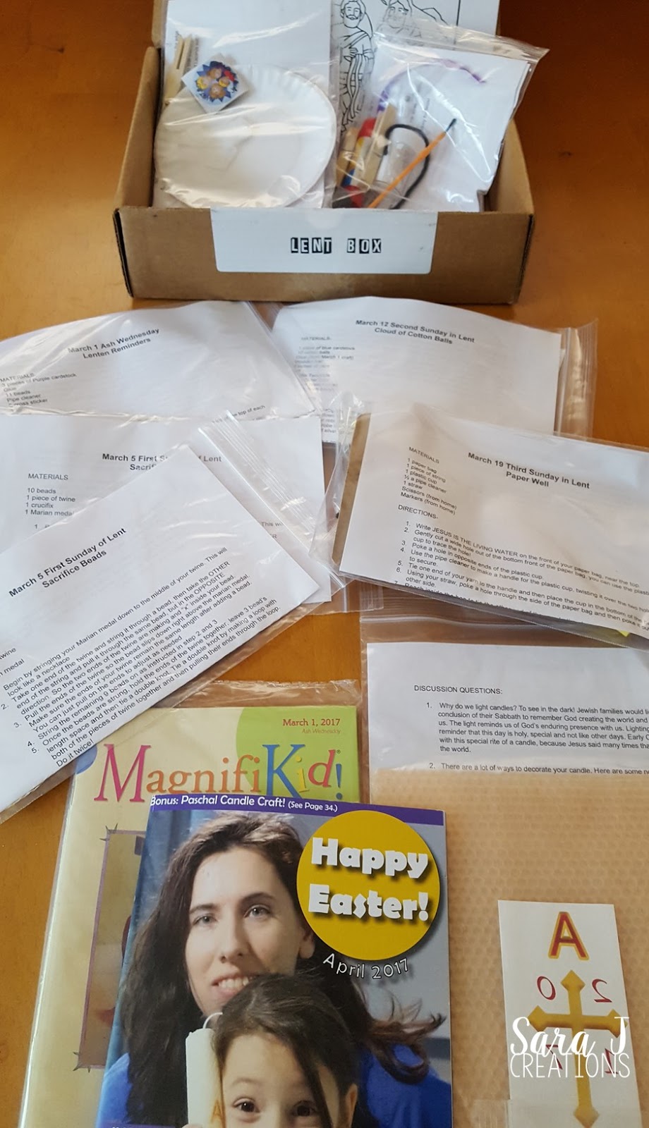 An honest review and giveaway of The Mass Box which provides a monthly subscription box for families that includes crafts that go along with the Sunday readings used during the Catholic Mass