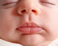 Close-up of baby face. Stock Photo credit: thi_nunes