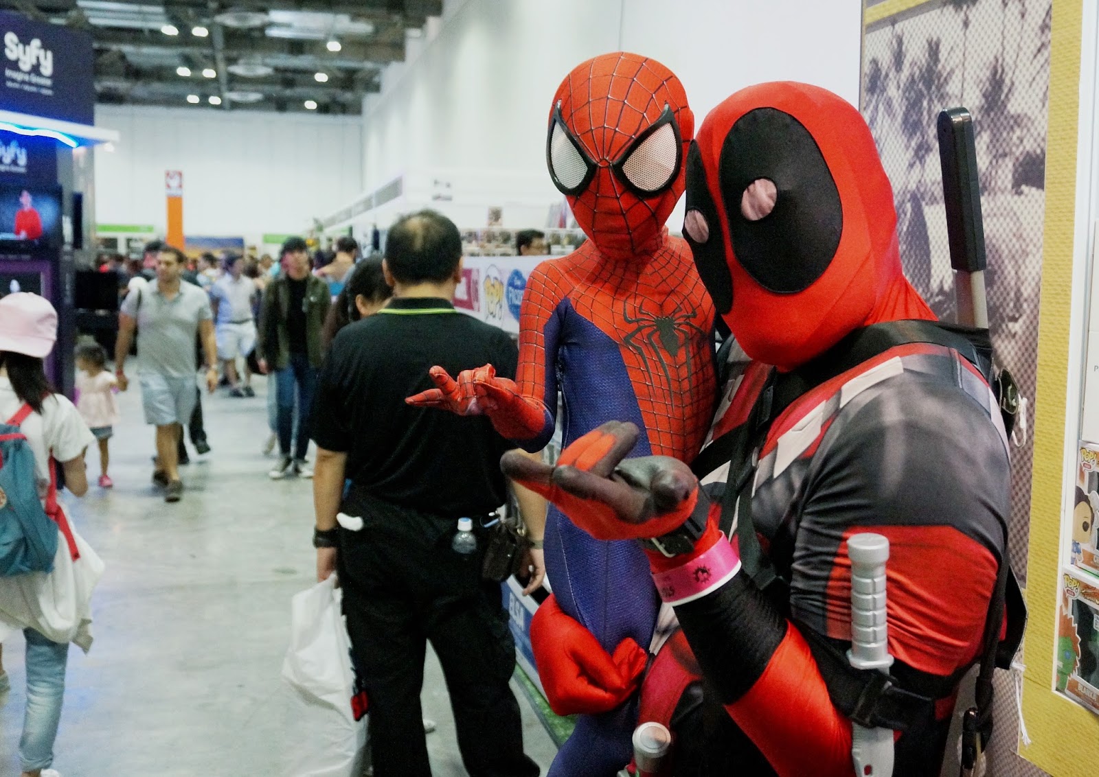 A father and his son cosplay DC character Batman (Left) and Marvel's  Spiderman enemy Doctor Octopus (Right) during the first day of the SOFA  (Salon del Ocio y la Fantasia) 2021, a