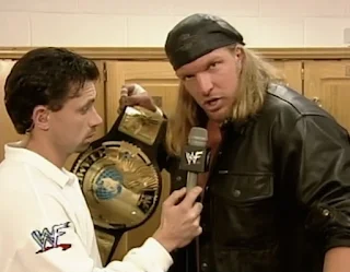 WWE / WWF Rebellion 1999 - Michael Cole interviews WWF Champion Triple H