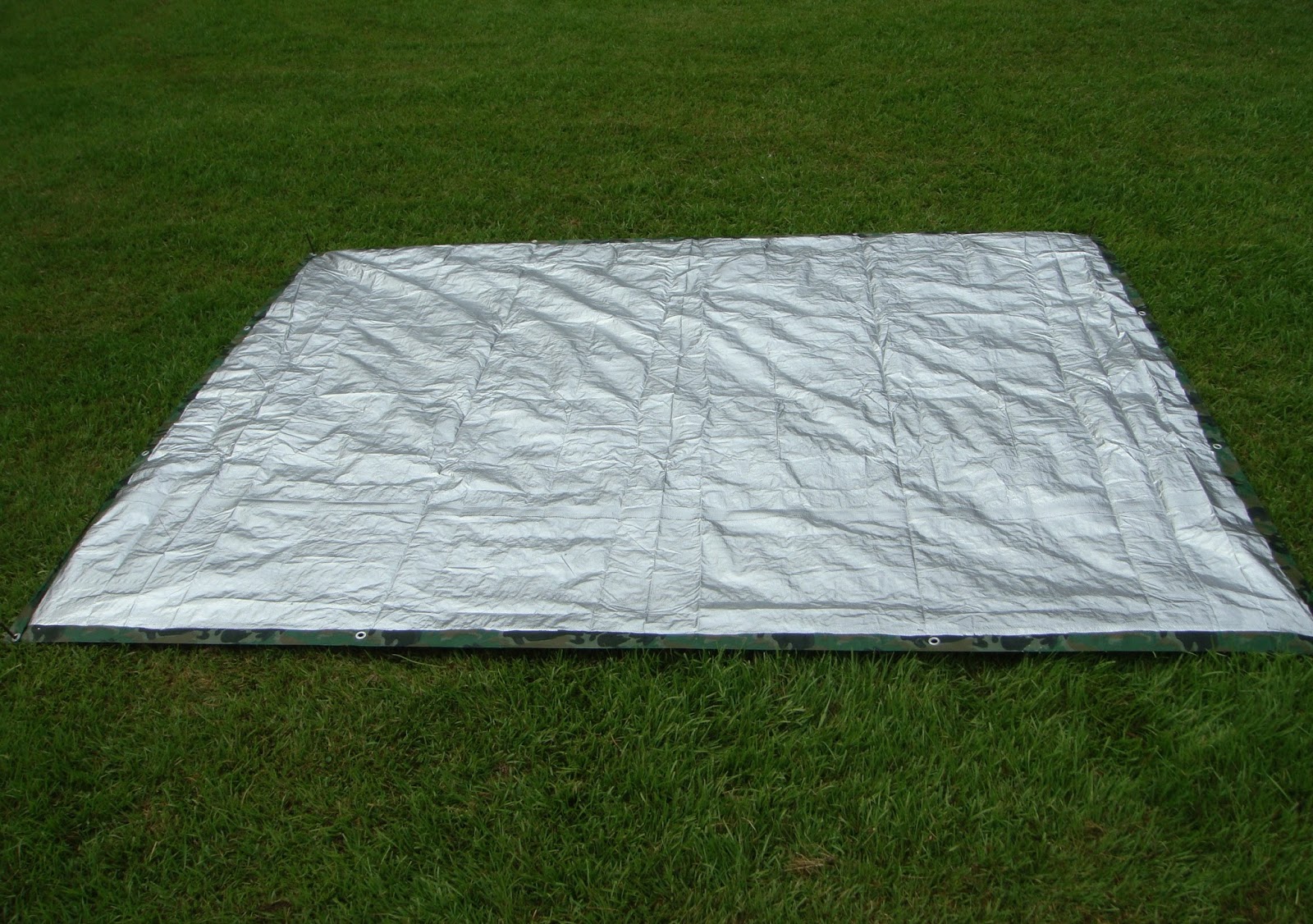 Sensible Survival Make an Inexpensive Reflector Tarp for a Warm