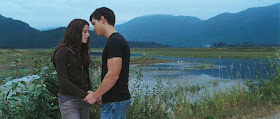 Edward and Bella with mountsins behind them in Twilight Saga: Eclipse 2010 movieloversreviews.filminspector.com