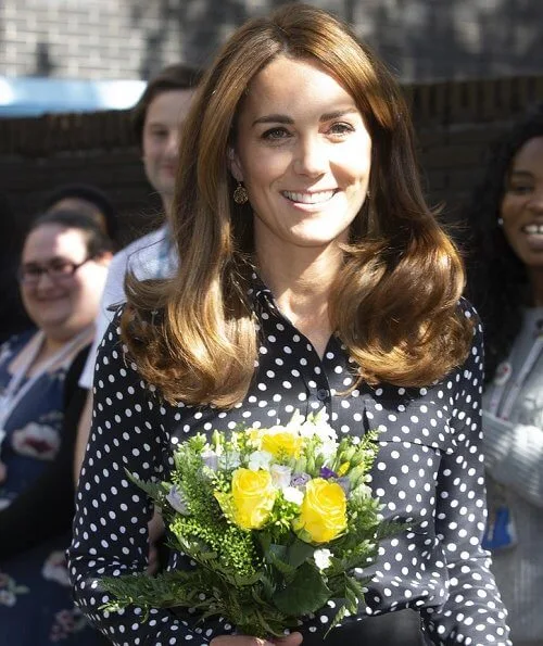 Kate Middleton wore a new polka-dot shirt by Equipment.and she wore a new high-waist wide leg trousers by Zara