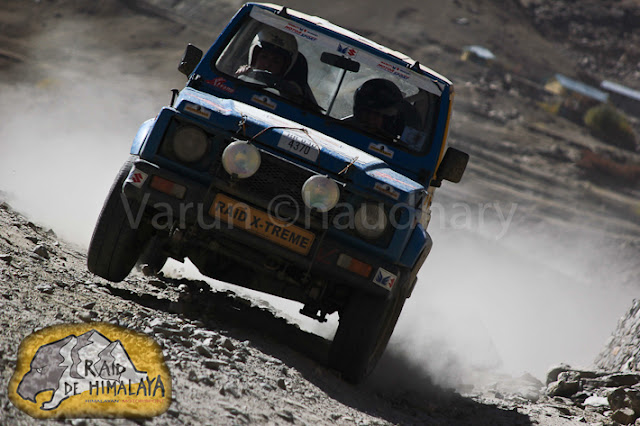 Maruti Suzuki Raid-de-Himalaya is India's toughest and most demanding motorsport rally which happens in Northern states of India - mainly Himachal Pradesh and J&K. Raid De Himalaya is open for both car and bike enthusiasts .... and for professional as well as amateur motorsport lovers.  Let's have a quick PHOTO JOURNEY by Varun Chaudhary (from Raid de Himalaya 2011)This journey is only covering some of the action shots of cars and another photo journey on bikes will follow soon... Above photograph shows a car flying across the snow covered hills and monasteries on the way while going towards J&K....The participants drive through some of the world's highest motorable roads and passes in the Himalayas like Jalori Pass, Rohtang Pass, Kunzum La, Baralacha La, Tanglang La & Khardung La, through really difficult terrains in Lahual and Spiti valleys in the Ladakh region.During Raid de Himalayas, all participants need to take care of their food on their own. Folks from various parts of country and world come to Himachal for Raid de Himalayas. Many folks have real craze about riding in Himalayas and face the real challenge in the world of motorsports.Most of the drive is through  snow covered hills of Himalayas, beautiful water streams and at times, temperature below -15 degree Celsius. On an average, a participant covers a distance of 300 kms every day in this approximately 1800 km and week-long motoring event.During the Raid, environment changes suddenly... These cars move so fast and suddenly snow covered hills touch to a land with rocky & dry hills... Most of the vehicles used during the rally for marked fit before start, otherwise folks are not allowed to continue to take care of security of participantsMaruti Suzuki and Himalayan Motorsport Association organize the Maruti Suzuki Raid-de-Himalaya every year  which actually need hard work and preparations. Spirit of motoring enthusiasts and Maruti Suzuki's commitment to promote motorsport in India has kept it going - year after year.It's always a wonderful experience to capture these folks at special moments with special effects.... Panning could be one of the very good ways of showing real action during Raid de Himalaya !!!If I clearly read, it's Sarachu written over the meter-board on road-side...Every year, more and more people participate in the Maruti Suzuki Raid-de-Himalaya and some of them from abroad as well. Maruti Suzuki Raid-de-Himalaya is the only Indian motorsport event listed on the off-road rallies calendar of FIM (Federation Internationale Motorcyclisme), Geneva, Switzerland. Only 12 international motoring events world-wide are listed in this calendar.The Maruti Suzuki Raid-de-Himalaya is held around October, just before the onset of winters in the Himalayan region and passes through lot of snow covered hills !!!The Maruti Suzuki Raid-de-Himalaya runs in three separate versions: Xtreme, Adventure Trial and Bike Xtreme !!!Xtreme is the toughest of Raid de Himalaya and it's open only to those 4 wheeler drivers who have prior rallying experience and have competed in one of the earlier editions of the Maruti Suzuki Raid-de-Himalaya or Maruti Suzuki Rally Desert StormAdventure Trial is open to those motor-sports enthusiasts who would like to take on the Himalayas but without the tough competition, difficulty and stress involved in the Xtreme. This section is open only to stock cars and only certain safety related modifications would be allowed in the competing cars. This is where first timers would fit in...   Car Category & SUV Category    Bikes Xtreme is open to bikes of all types and makes but there are certain regulations that they have to adhere to. The bikers are probably the bravest of the Raiders, as they have to face the hostile weather, terrain without the comforts of a cabin surrounding them.Some of the online media websites regularly track the progress of this one week long rally - Raid de Himalaya... One of the example can be seen at http://hillpost.in/category/sports/raid-de-himalayaAll these colorful cars in various sizes, shapes and models don't run but literally fly in air. Each car rider need to come with a navigator who can guide the rider about appropriate details about location, distance, timing and other security measures about controls etc.Also each team to make sure that helping car is coming along which has all necessary equipments for repairing the cars/bikes if needed... Many times these enthusiasts know much about their cars/bikes, but it's preferred to have specialists with them to be on safer side.It's of course an expensive affair and many folks get appropriate sponsorships to join such rallies. From vehicle to maintenance and all other miscellaneous expenses are too much... Even most of the vehicles are very well designed for such rallied.... They need to be really special to be a part of Raid de Himalaya....Raid de Himalaya 2011 was 13th event and 150+ participants came this time !!So here ends the cars rally during Raid de Himalaya 2011 and Bikers rally will follow soon... Varun Chaudhary who clicked all these photographs can reached at - Facebook Gmail