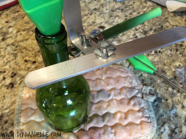 How to cut a wine bottle. Scoring a line on the bottle.