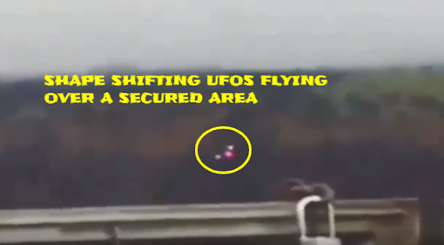 Three UFOs flying in formation over a secured area and turn in to one UFO.