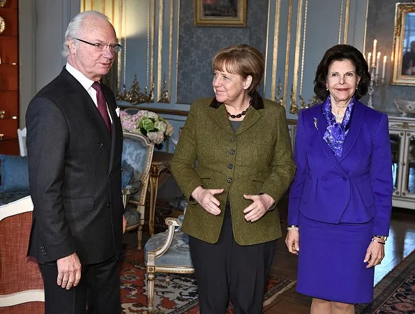 King Carl Gustaf and Queen Silvia met with German Chancellor Angela Merkel at Royal Palace in Stockholm
