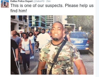 1a The face of one of the snipers who killed 4 police officers and injured 7 other officers