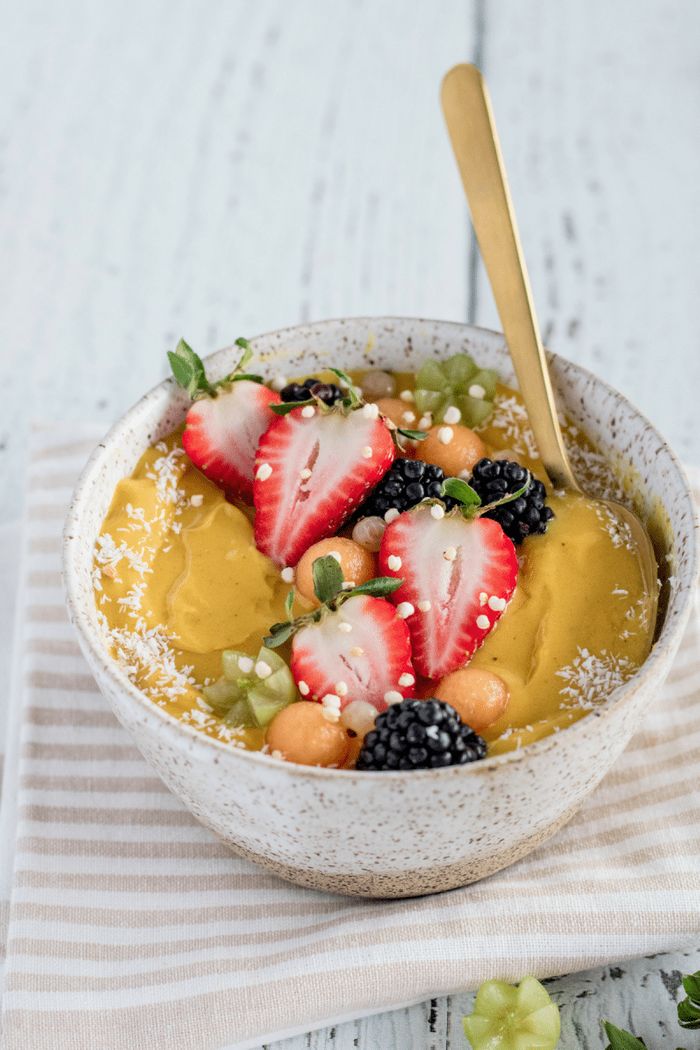 Turmeric Golden milk Smoothie Bowl | Find 11+ Vegan Smoothie Bowls To Make Again and Again | health smoothies | yummy smoothies | home made smoothies | nondairy smoothies #breakfast #cleaneating #healthy #veganfood