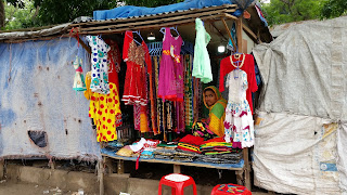 A nice clothing shop in the Korail Basti slum