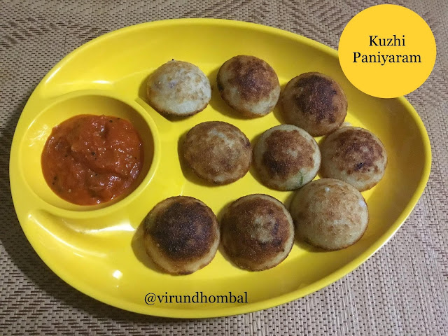 Kuzhi Paniyaram Kuzhi Paniyaram - Kuzhi Paniyaram is an easy and healthy tiffin prepared with a few basic ingredients in our kitchen.Once you have decided to prepare kuzhi paniyaram for your dinner, prepare the batter and allow it to ferment for 5 to 7 hours. You can also ferment the batter overnight and you can prepare a healthy tiffin for your family during weekends. Makes an easy tiffin for your regular week night or weekend breakfast. It's spongy and slightly crispy on the outside and soft on the inside. In this kuzhi paniyaram recipe, you need idly rice, raw rice, urid dal, fenugreek and other tempering ingredients. Many people prepare kuzhi paniyaram with the dosa batter, but I recommend to grind the batter separately for kuzhi paniyaram. Never skip the fenugreek because it helps to give you a soft and spongy paniyarams. To add additional flavours I have added fresh grated coconuts, chopped onions and green chillies. For frying the kuzhi paniyaram you can use groundnut oil or gingely oil. Finally, don't forget to prepare tomato chutney to serve this yummy kuzhi paniyaram. Because it's one of the best side side dish for this kuzhi paniyaram. Now we will see the recipe in detail.