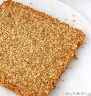 Perfectly easy to make oatmeal bars that are kissed with brown sugar are a great grab and go breakfast or fun homemade snack. oatmeal bars dumped out of the pan